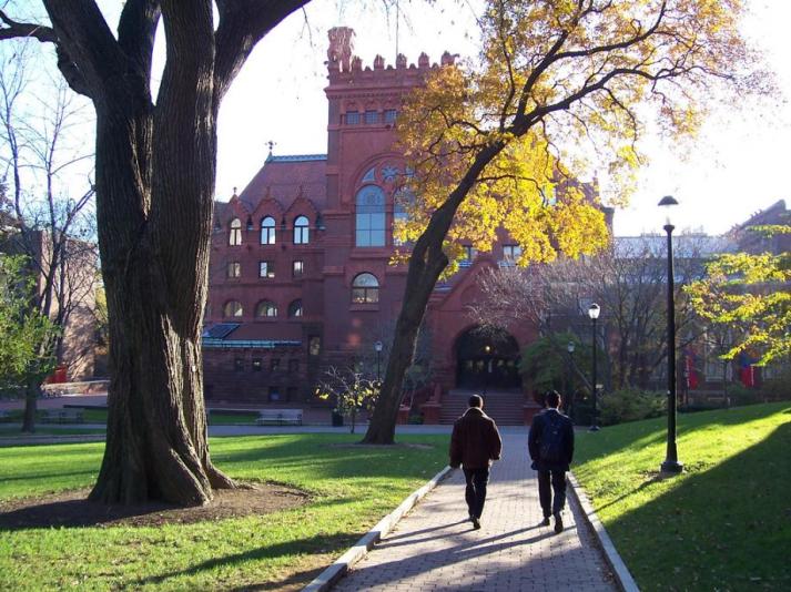 Students walking toward library