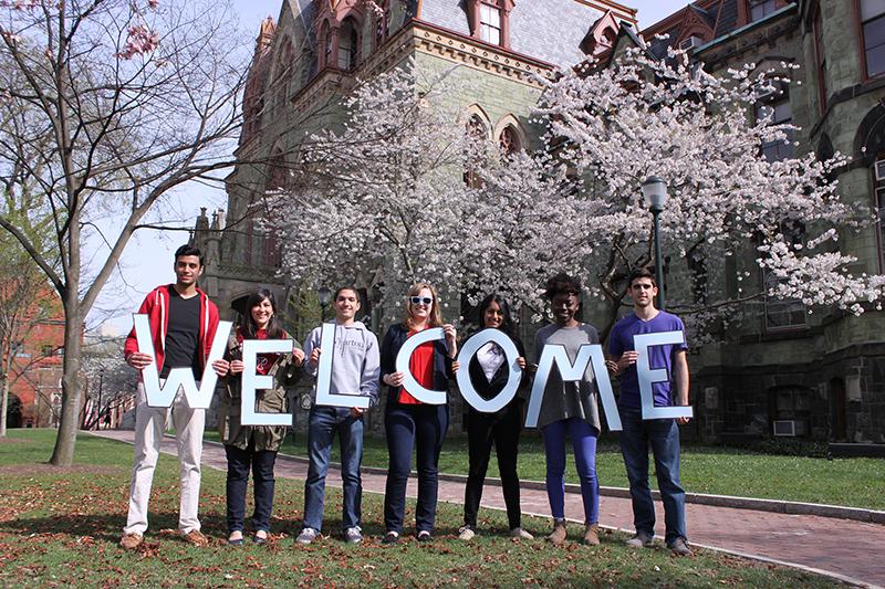 Students holding welcome sign